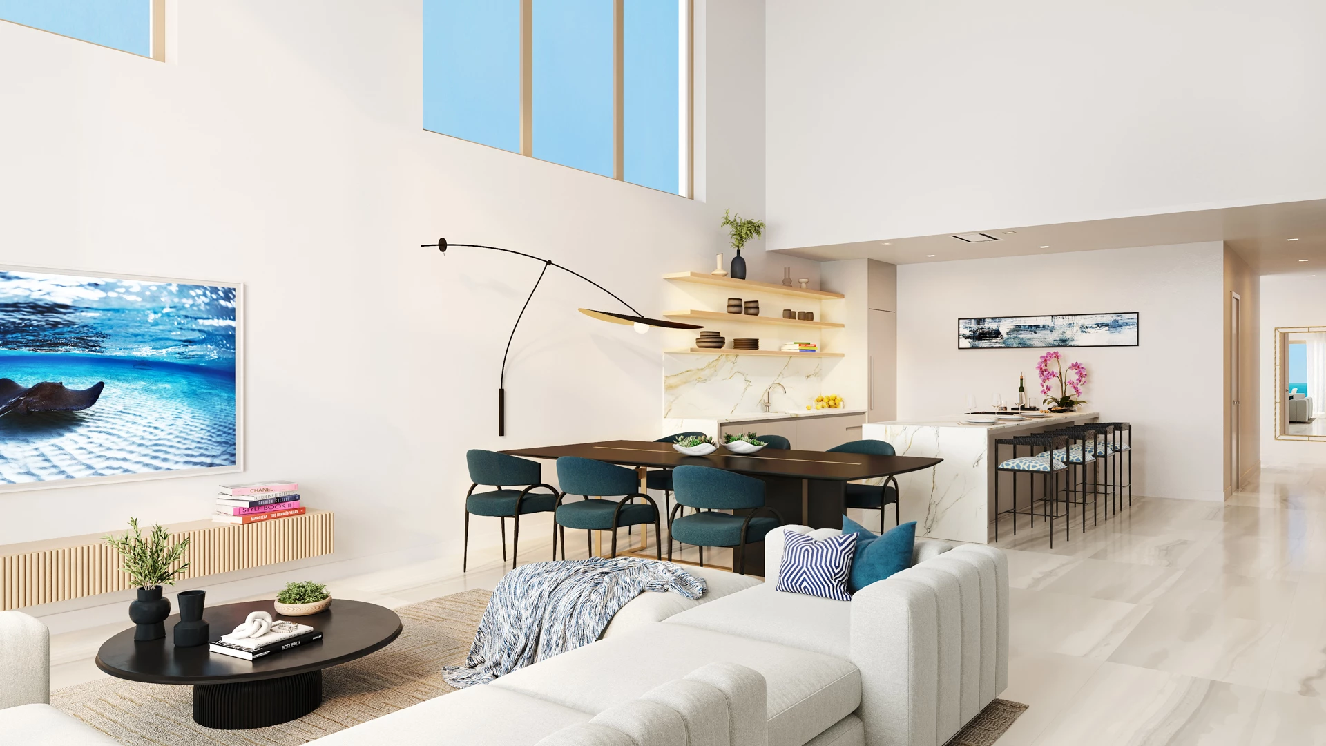 a living room with a table and chairs