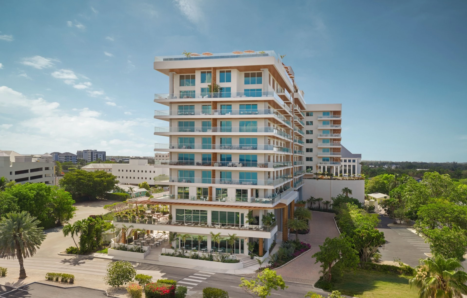 a building with trees and grass