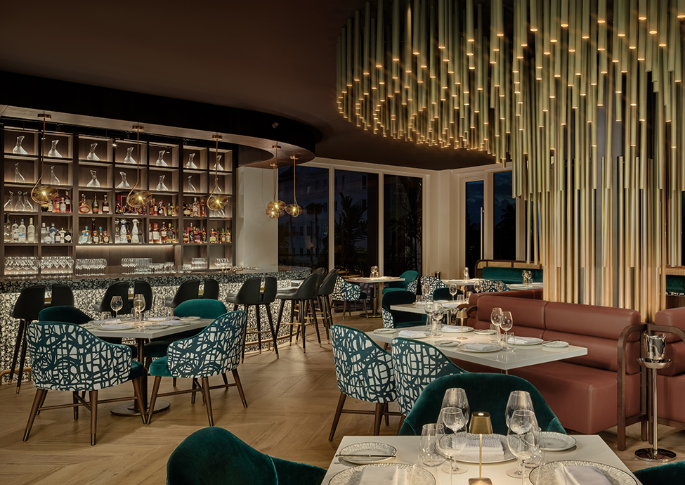 a restaurant with tables and chairs