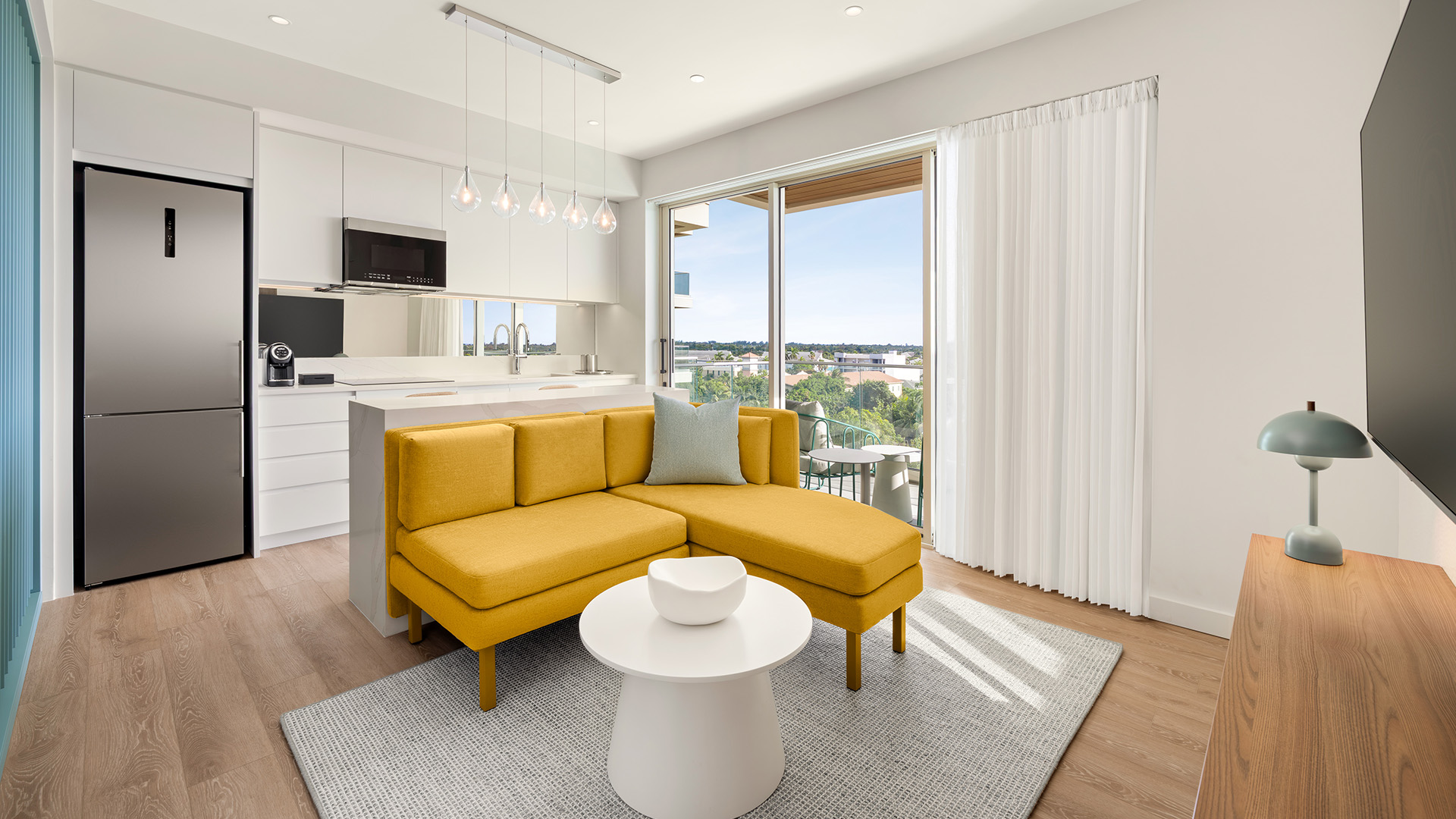 a living room with a couch and a table