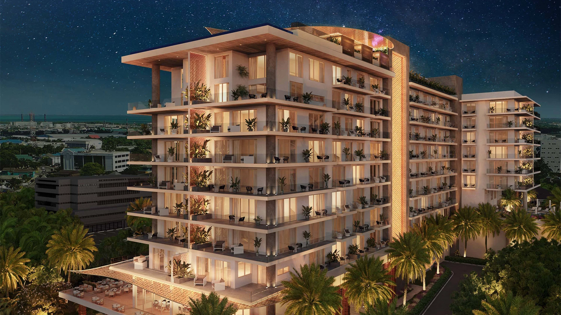 a building with palm trees and lights