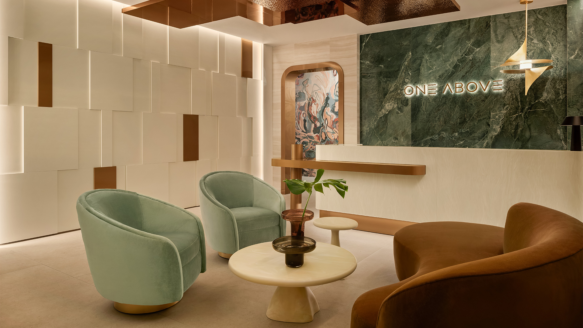 a lobby with chairs and a table