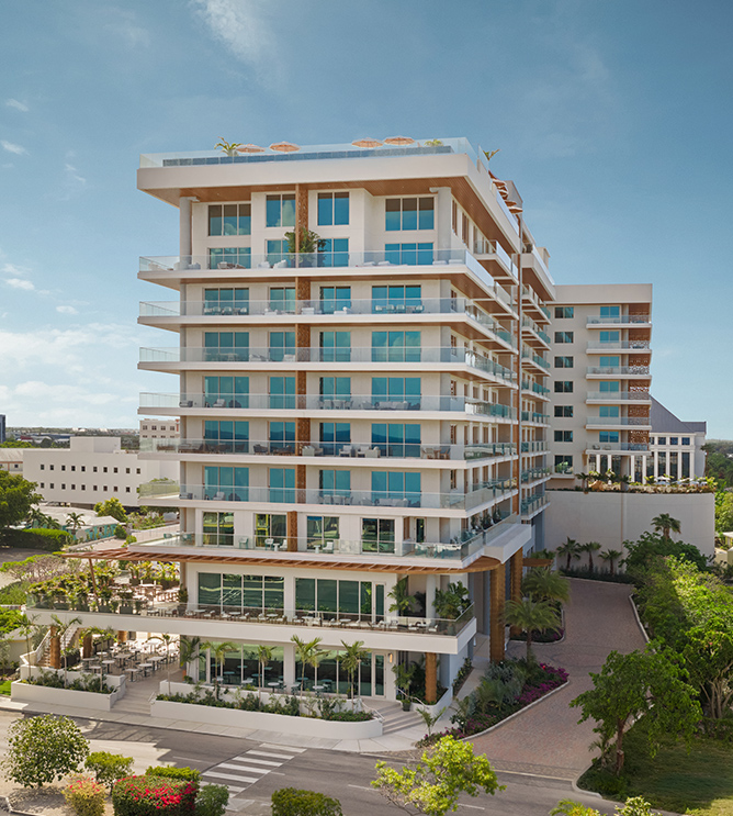 a building with trees and plants