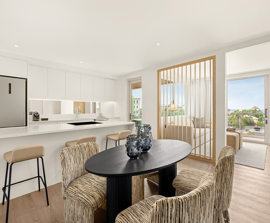 a room with a table and chairs