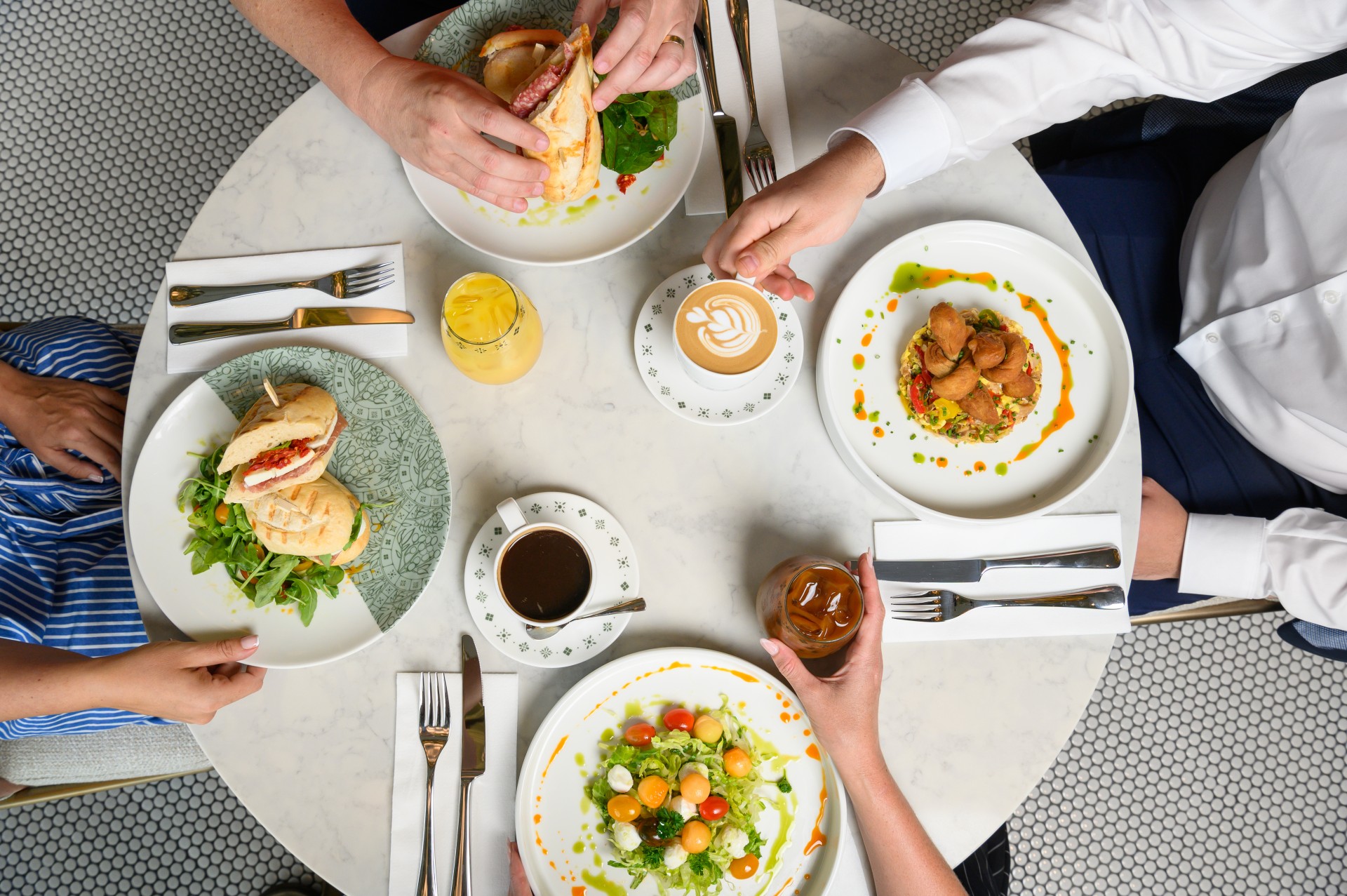 a group of people eating at a table