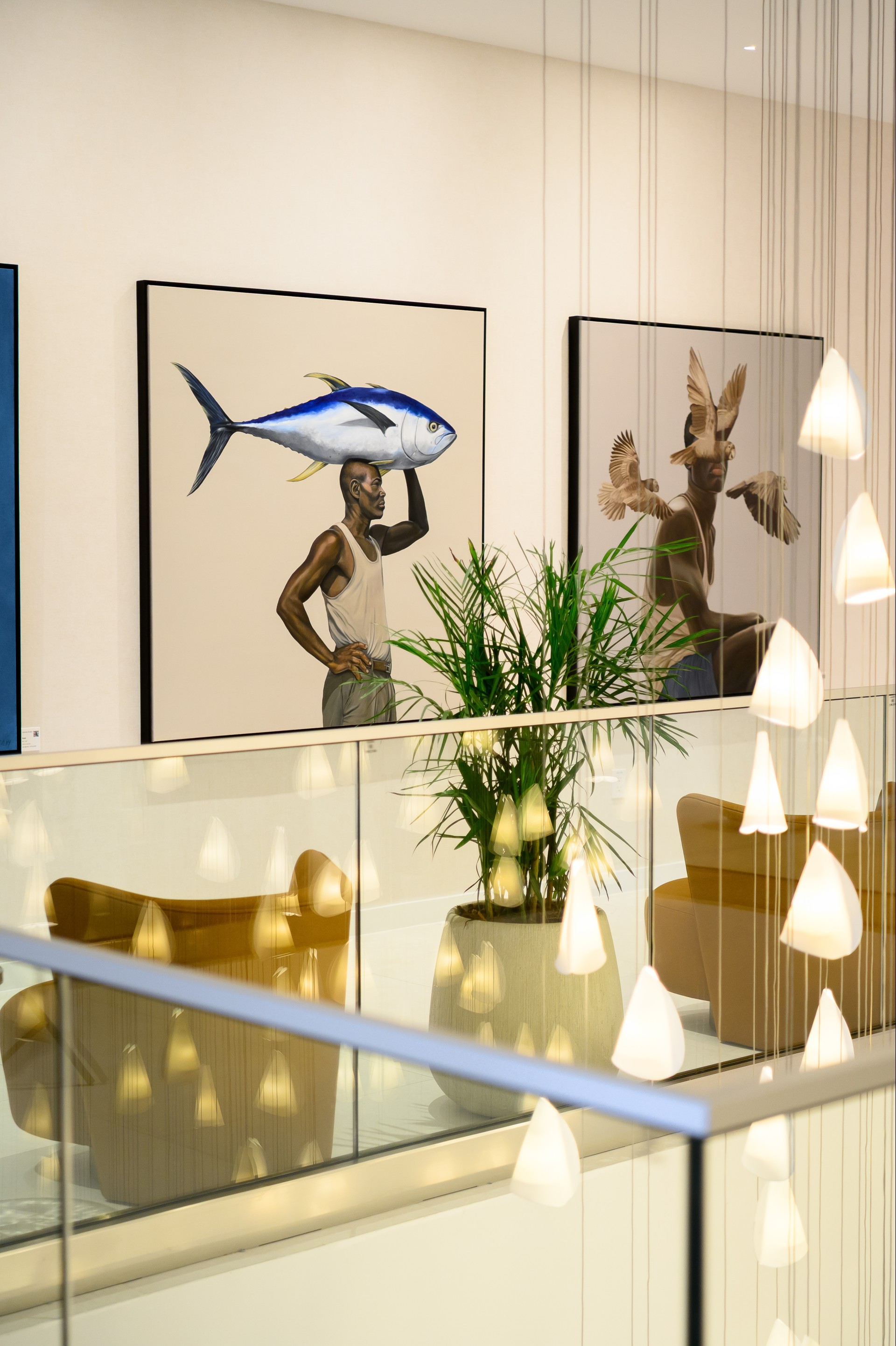 a room with a fish on his head