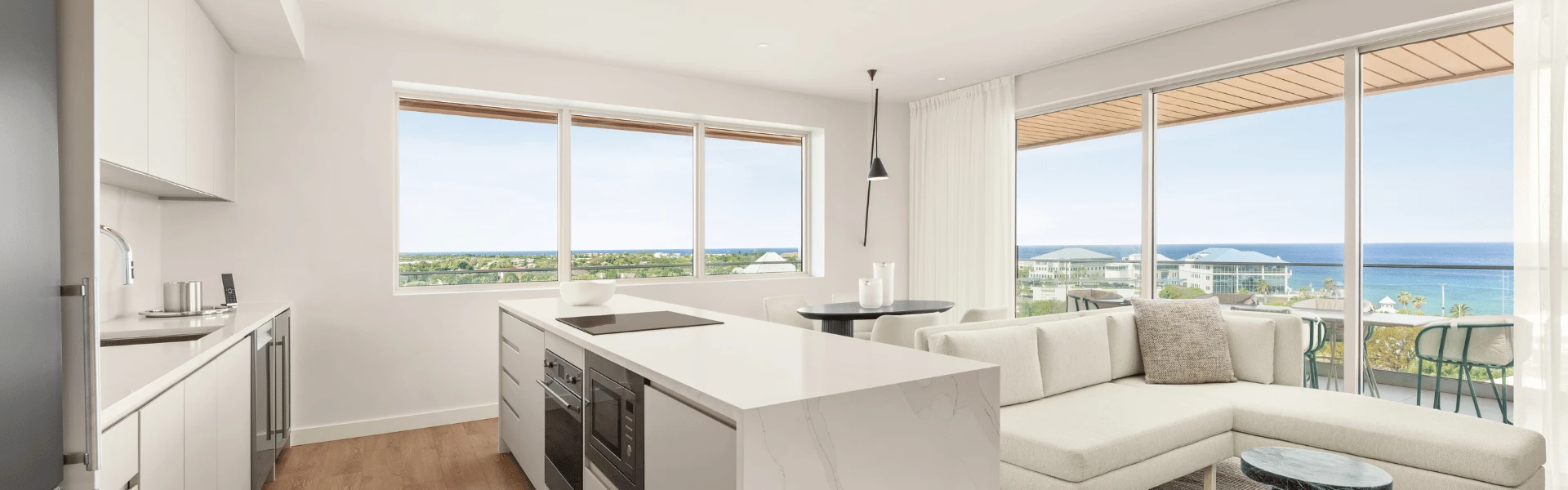 a kitchen with a table and chairs