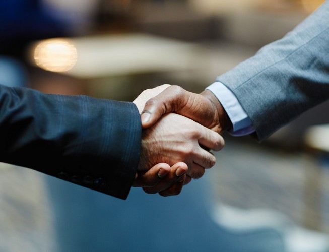two business men shaking hands