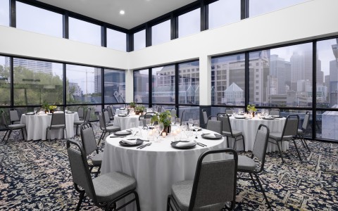 a room with tables and chairs