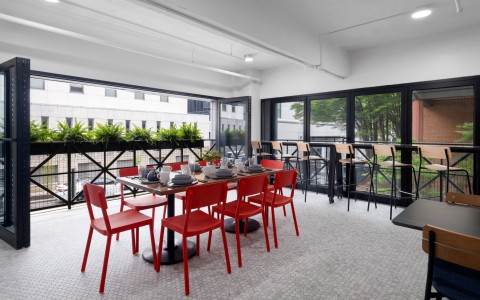 a room with a table and chairs
