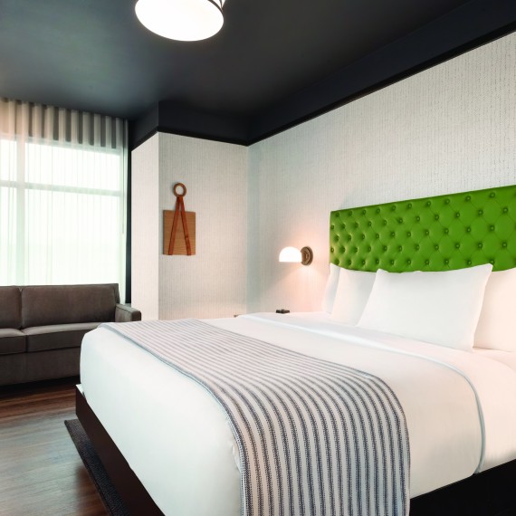 a room with a bed and a couch