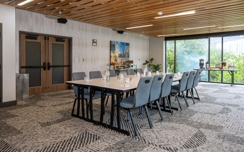 a room with a table and chairs