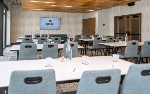 a room with tables and chairs