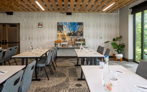 a room with tables and chairs