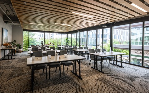 a room with tables and chairs
