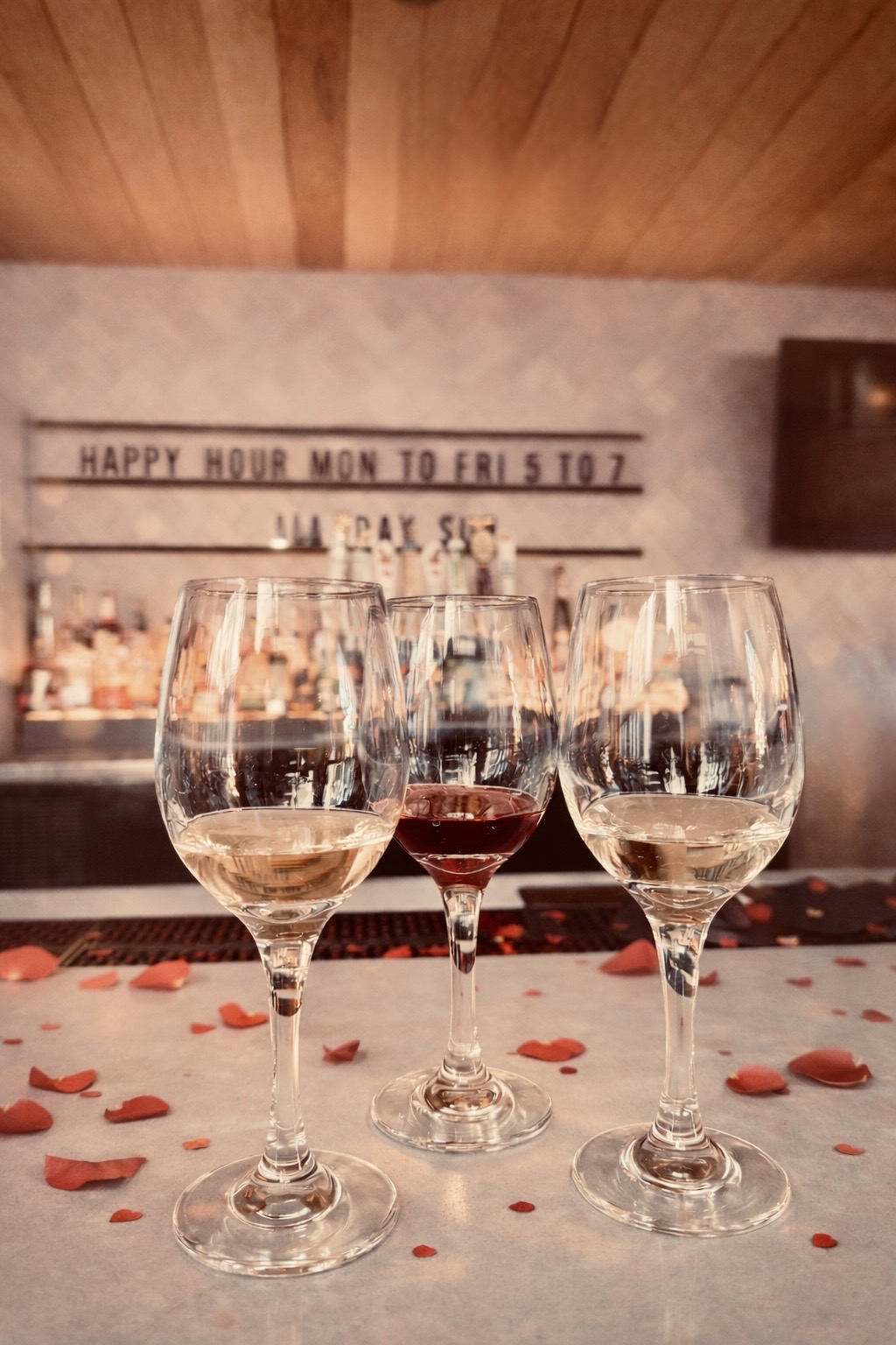a group of wine glasses on a table