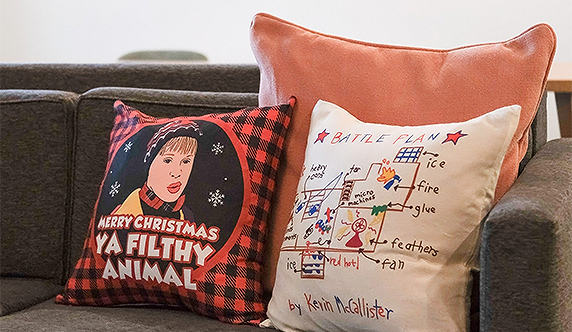 a group of pillows on a couch