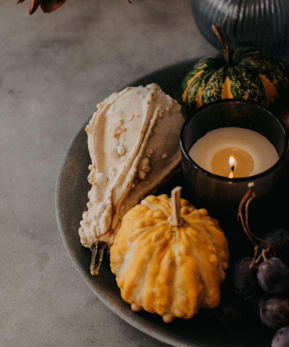 a plate of food and a candle