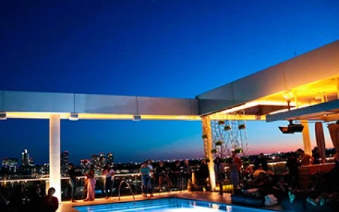 a pool with people around it
