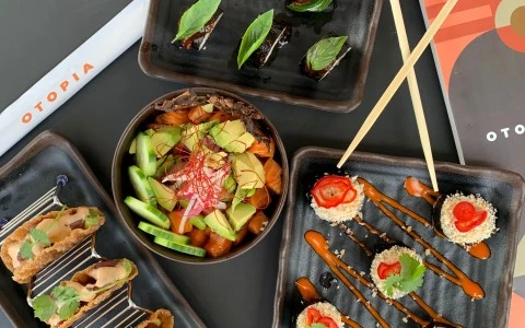 plate filled with little bites and chopsticks