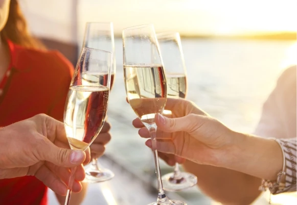 a group of people toasting with champagne
