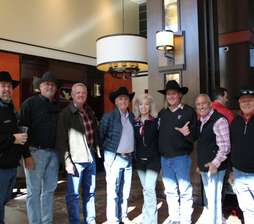 a group of people posing for a photo