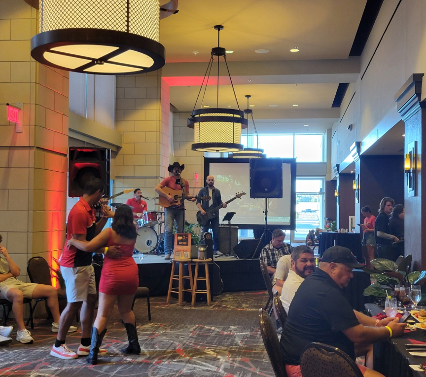 a group of people playing instruments in a room