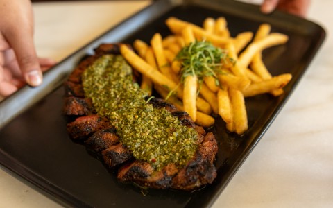 a plate of food with a sauce on it