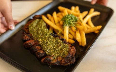 a plate of food with a sauce on it