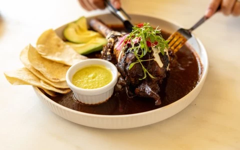 a plate of food with a fork and knife