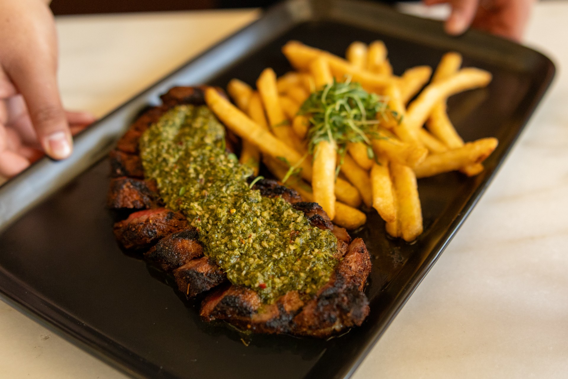 a plate of food with a sauce on it