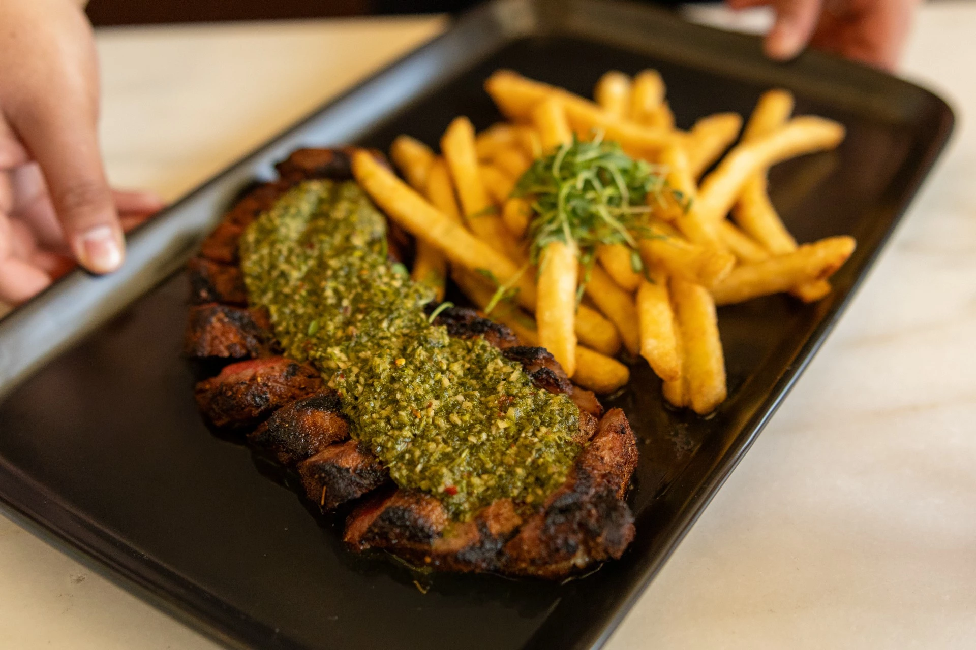 a plate of food with a sauce on it