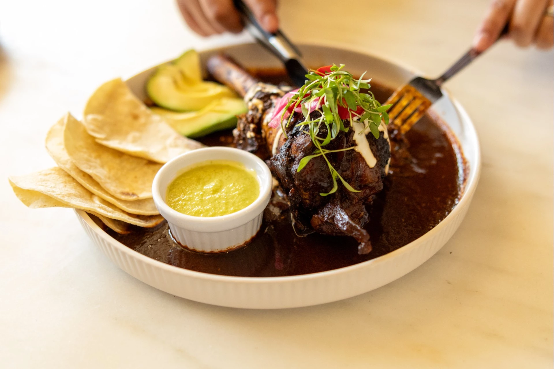 a plate of food with a fork and knife
