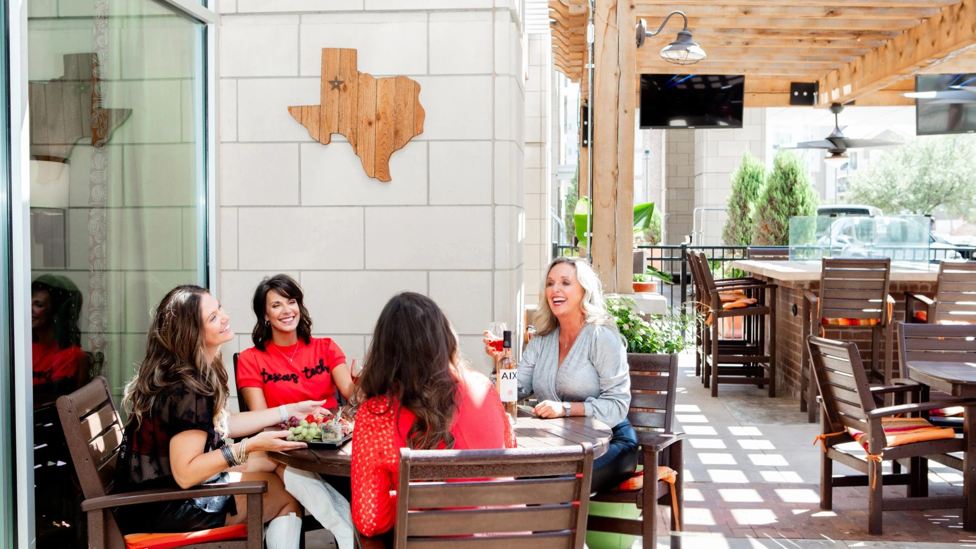 a group of women sitting at a table