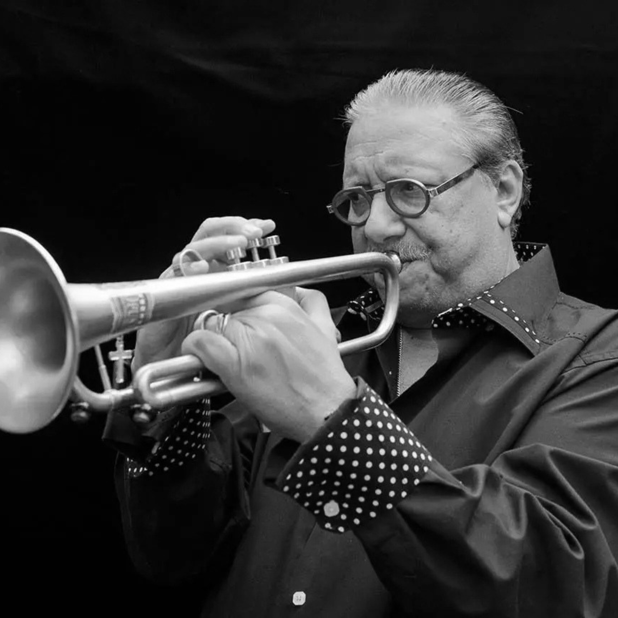a man playing a trumpet