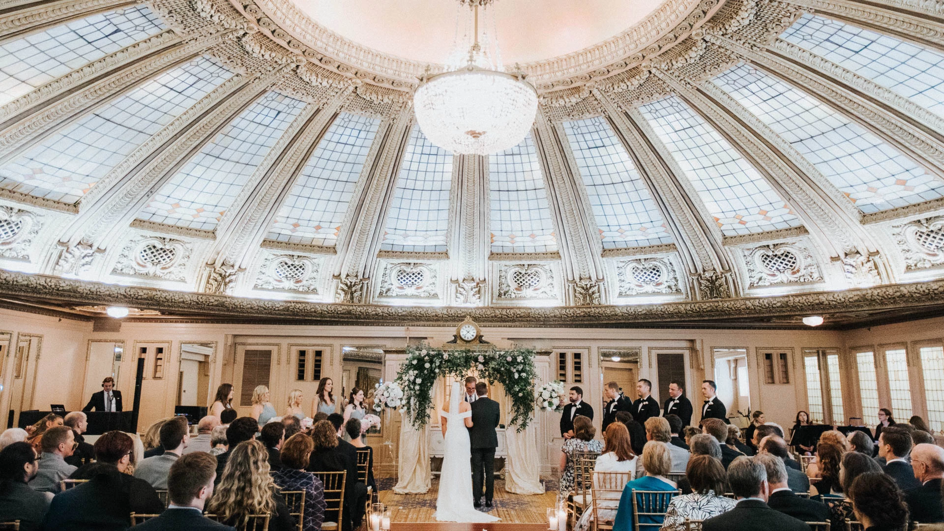 a man and woman under a dome ceiling