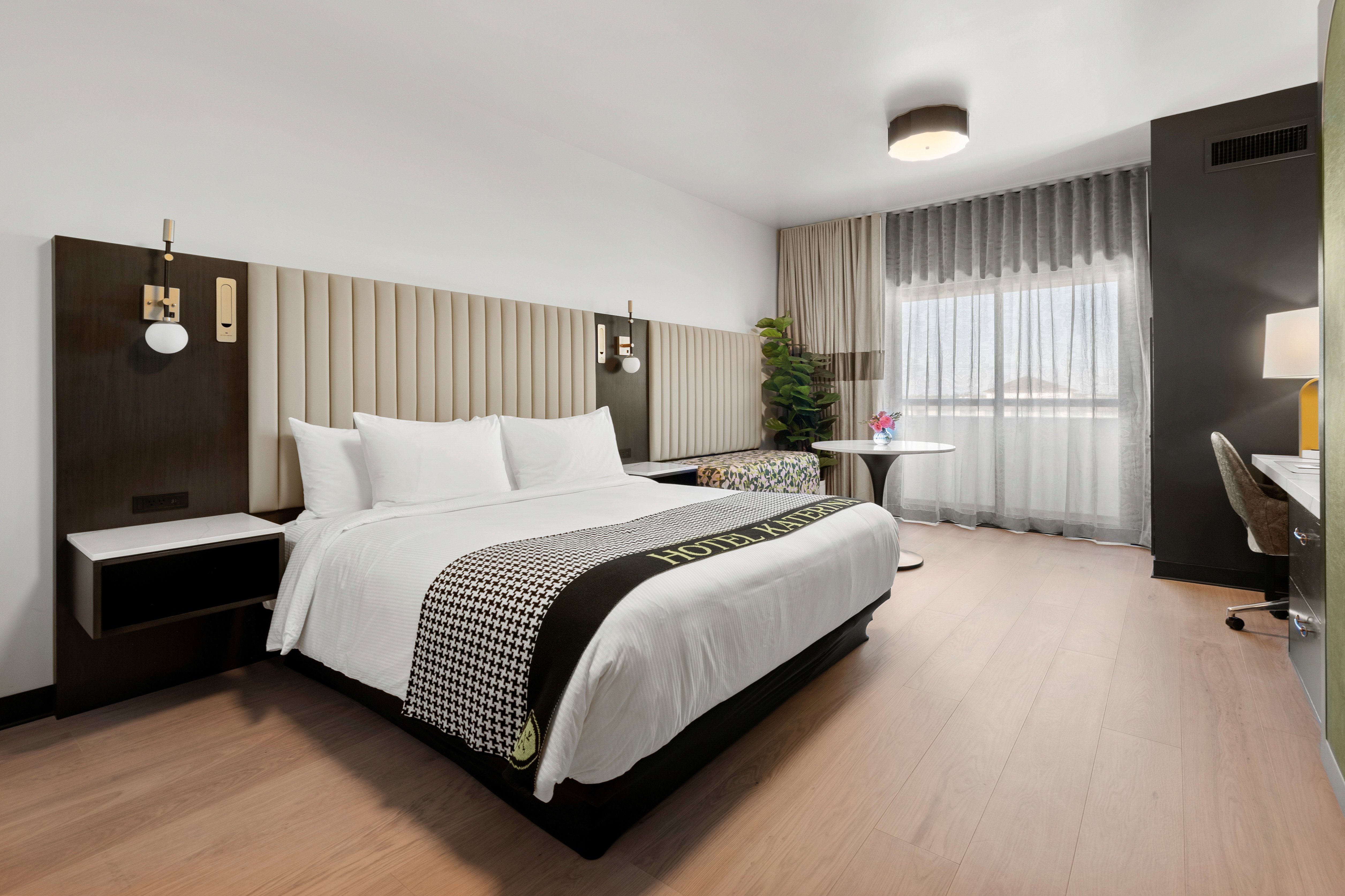 a room with a bed and a table