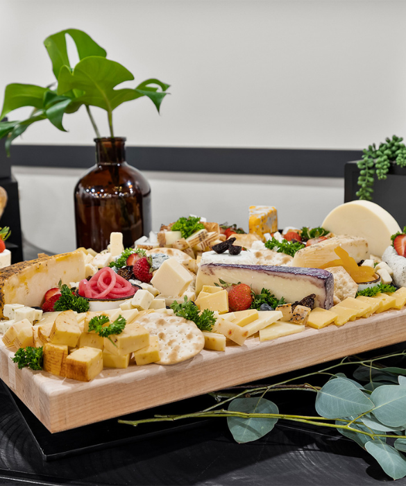 a tray of cheese on a table
