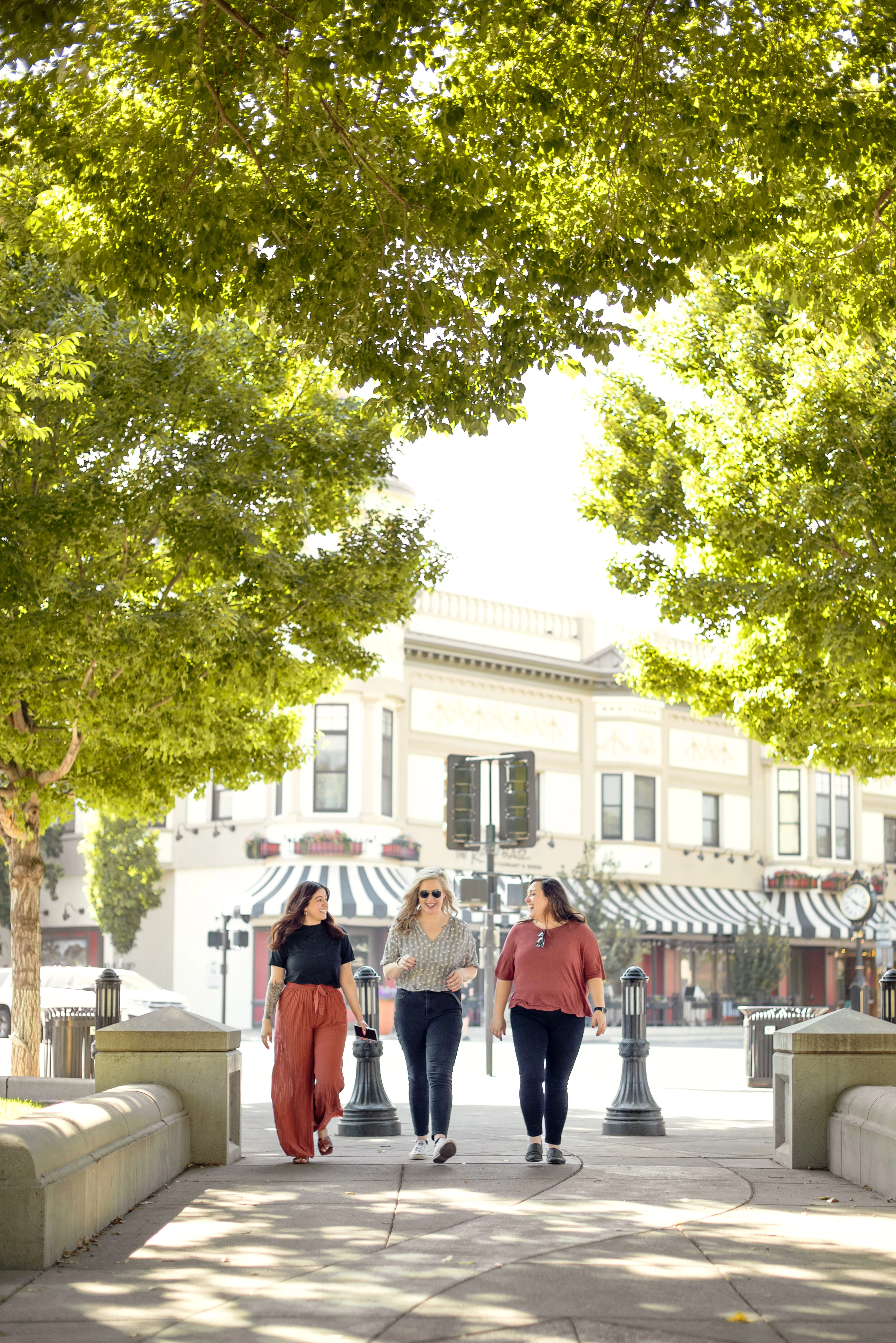 Three women walking in downtown Chico