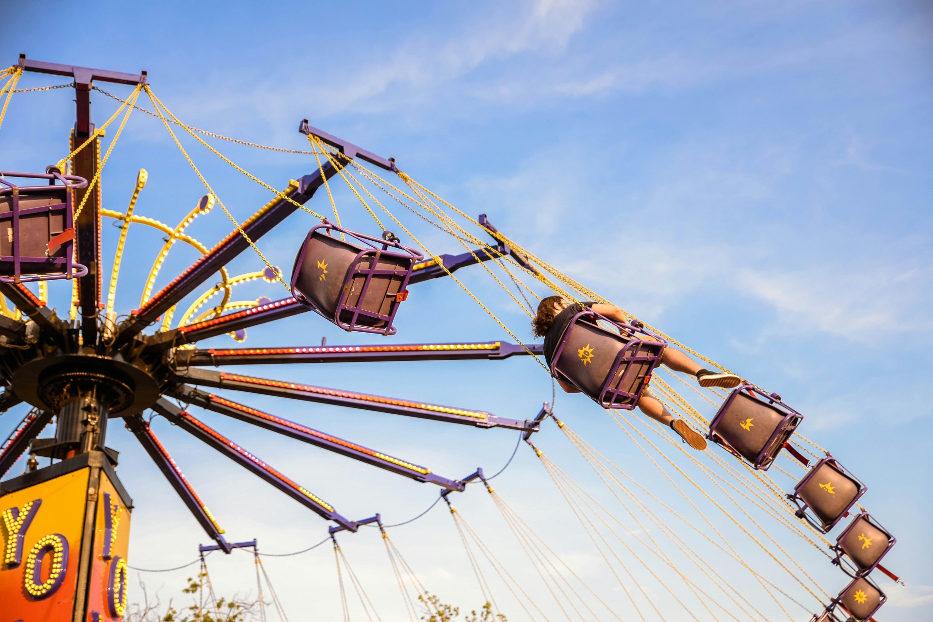 people on a ride at the california mid state fair in paso robles 