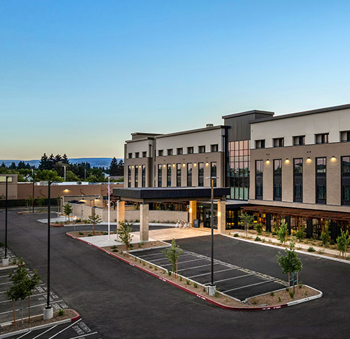 a building with a parking lot