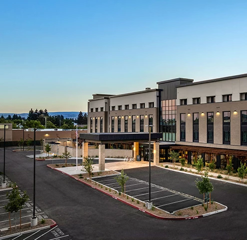 a building with a parking lot