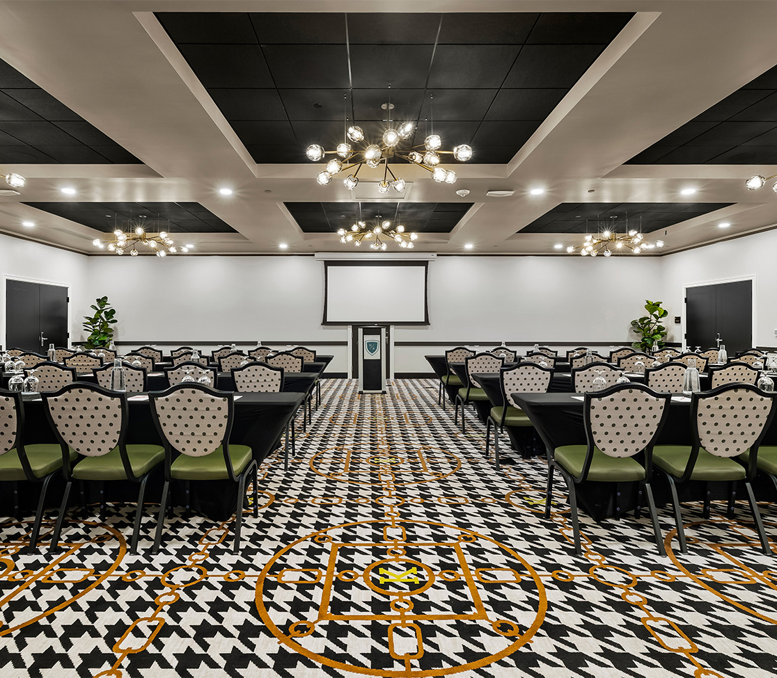 a room with chairs and a projector