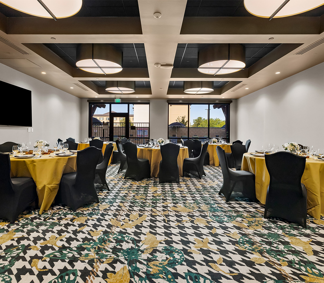 a room with tables and chairs