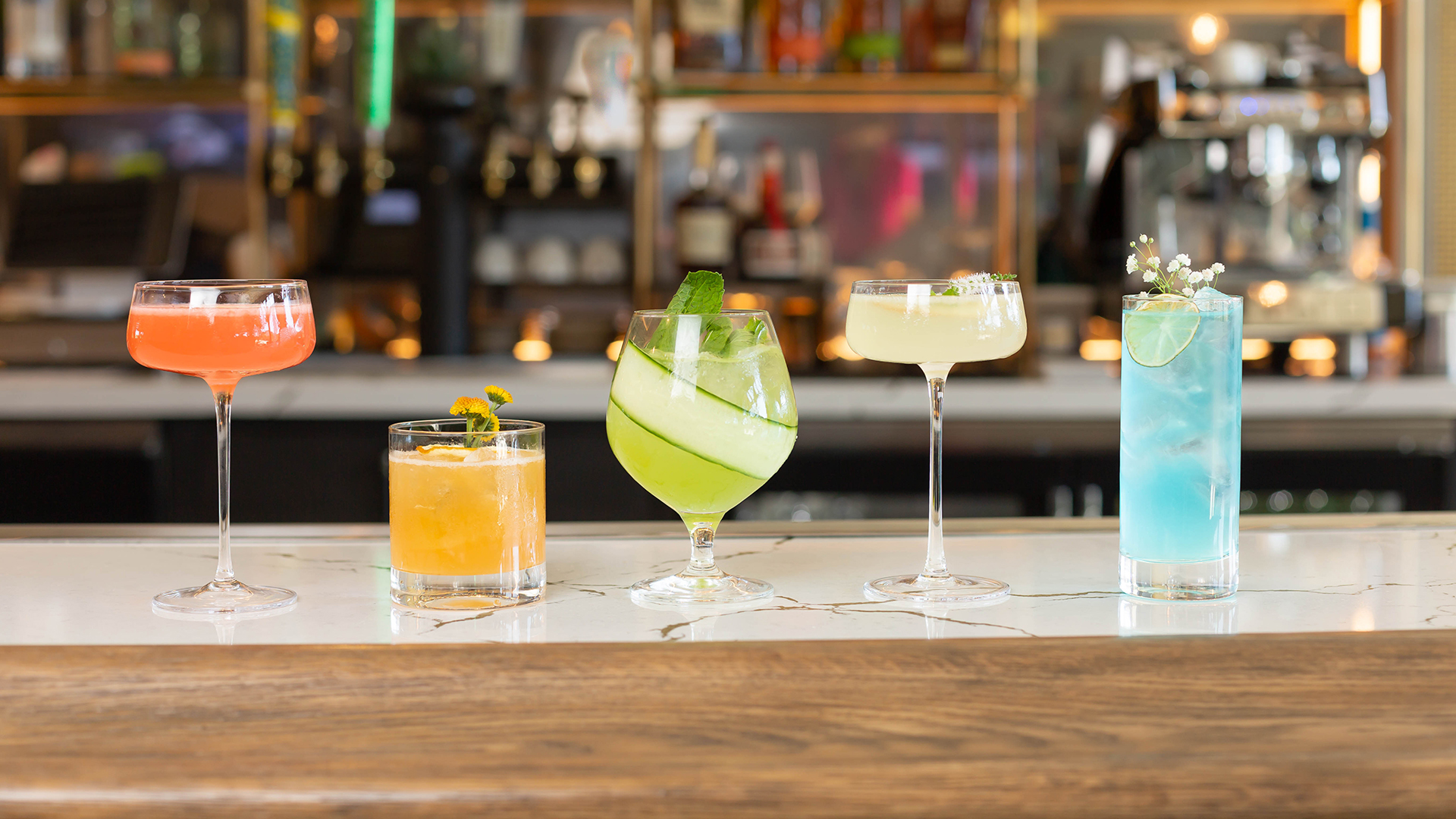 a group of drinks on a counter