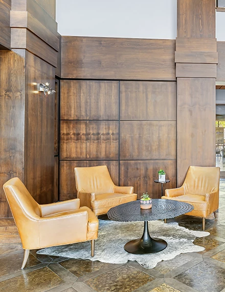a room with chairs and a table