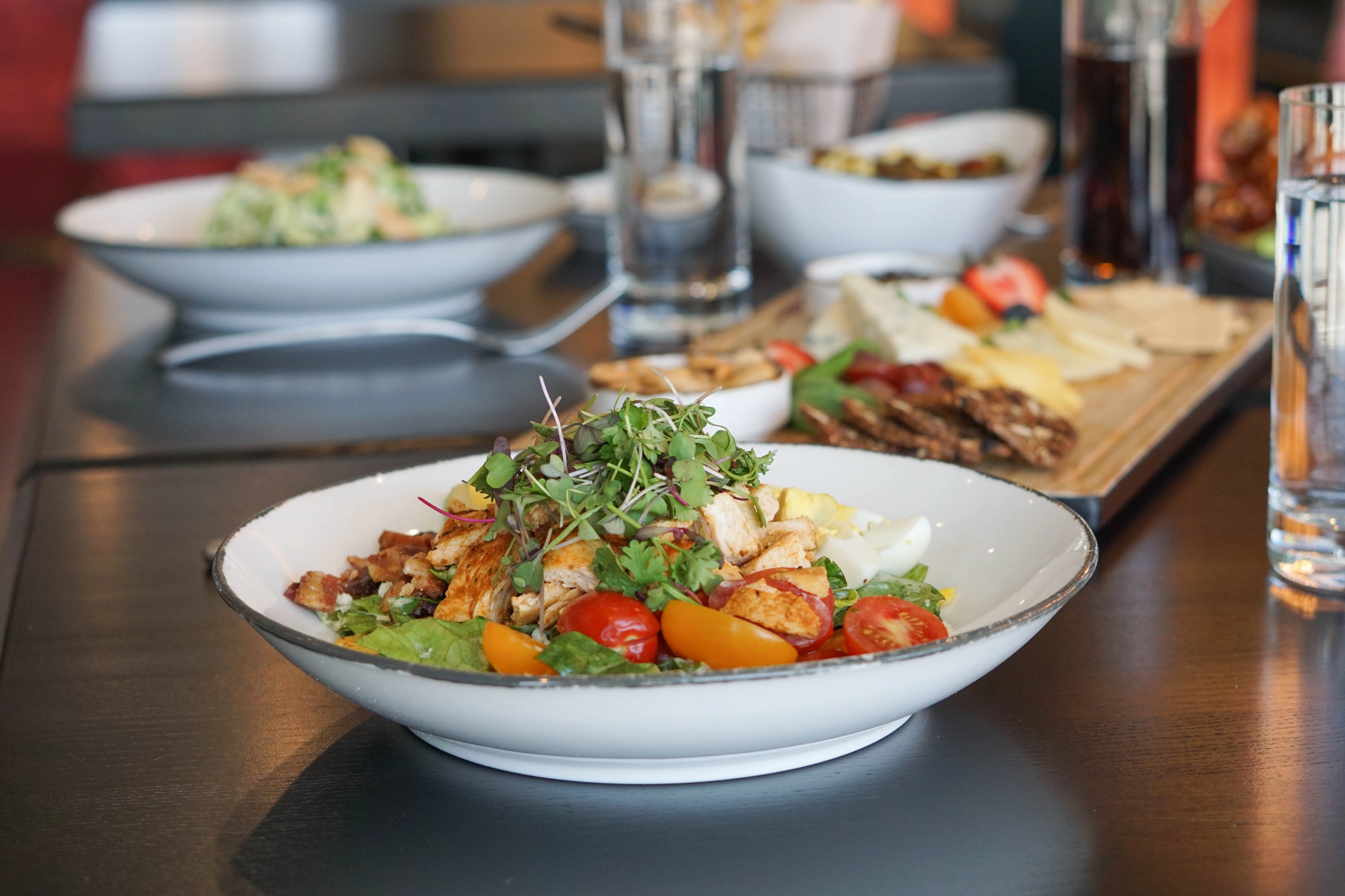 a bowl of salad on a table