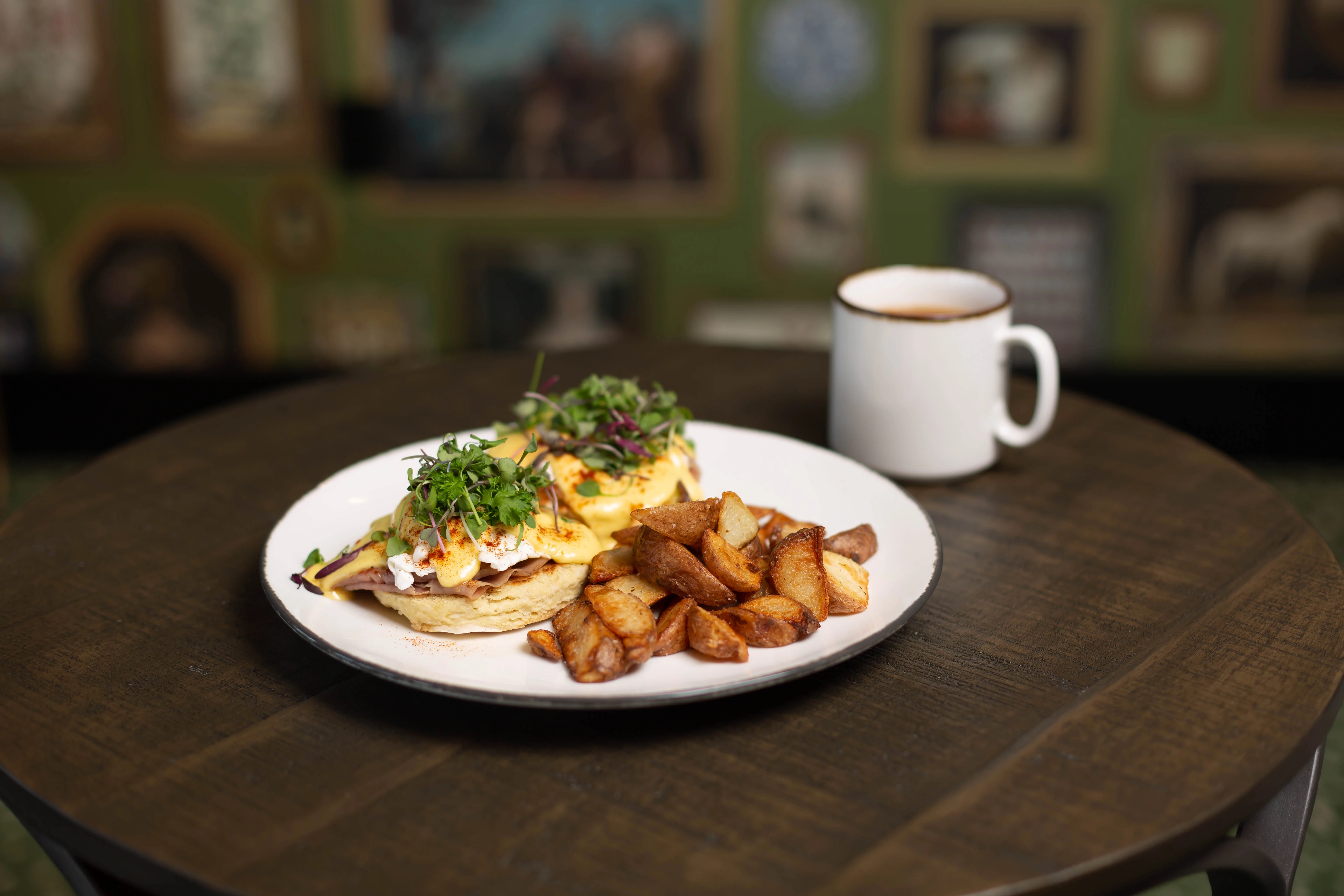 a plate of food and a cup of coffee