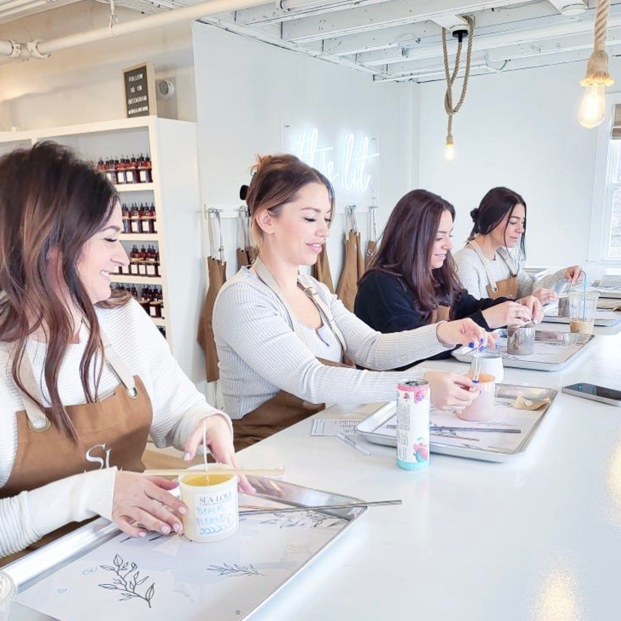 a group of women sitting at a table