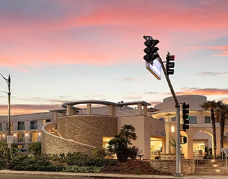 Exterior of the redondo beach hotel at sunset